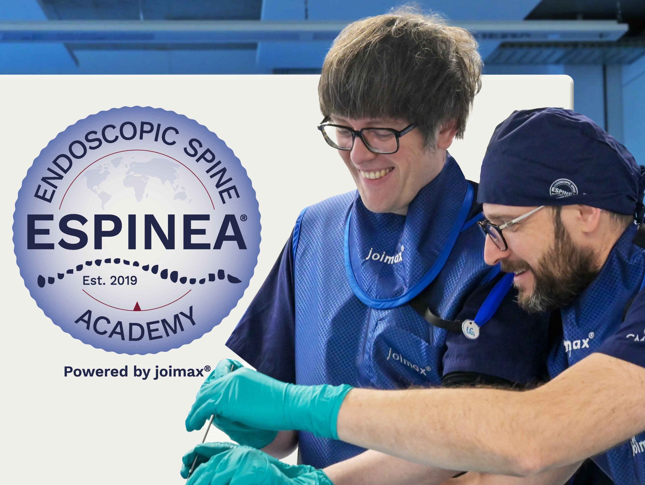 Two Surgeons in a endoscopic spine surgery education and training environment with the ESPINEA Logo in the Background